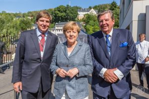 od lewej: Anton Rupert, Angela Merkel, Johann Rupert
